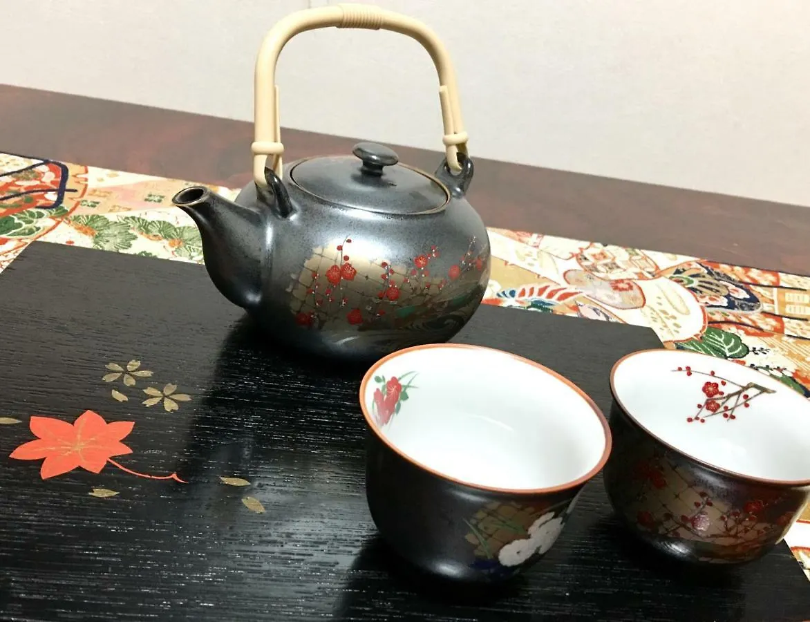 Osaka Guesthouse Sayuri Honkan בית הארחה